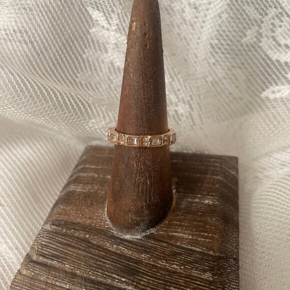 Elegant Gold Eternity Band with Baguette Crystals - Picture 2 of 4